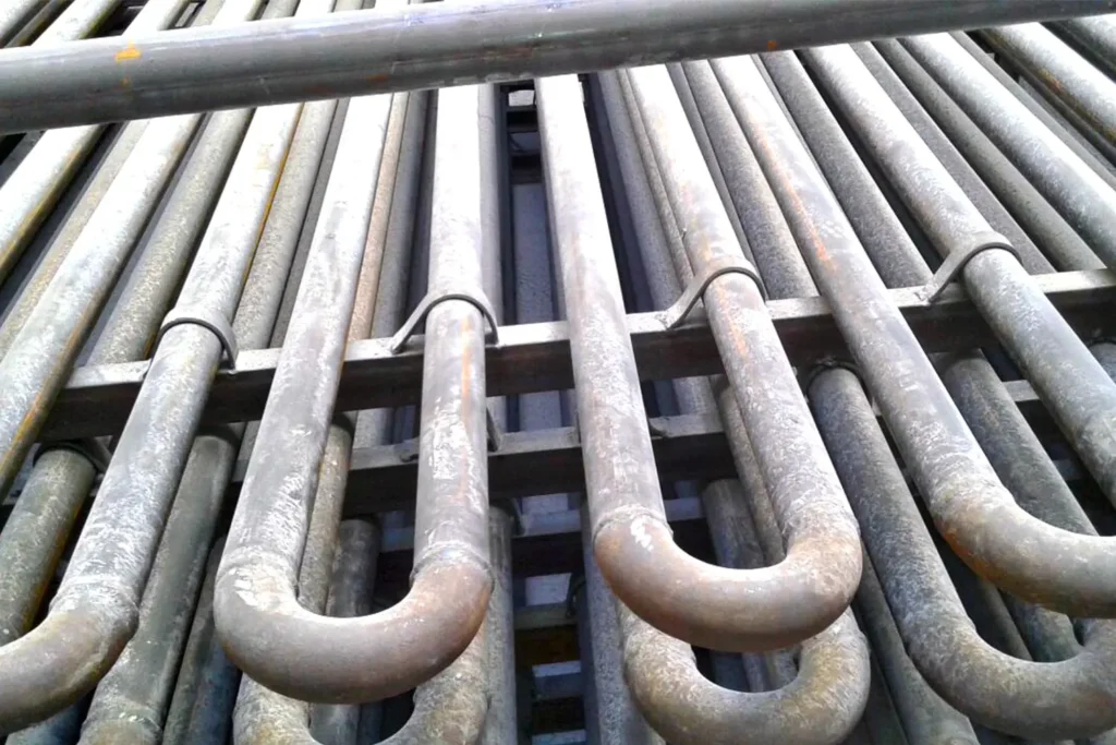 Thermal oil heating coils installed inside a reinforced concrete bitumen storage pit to maintain the required bitumen temperature for continuous operation.